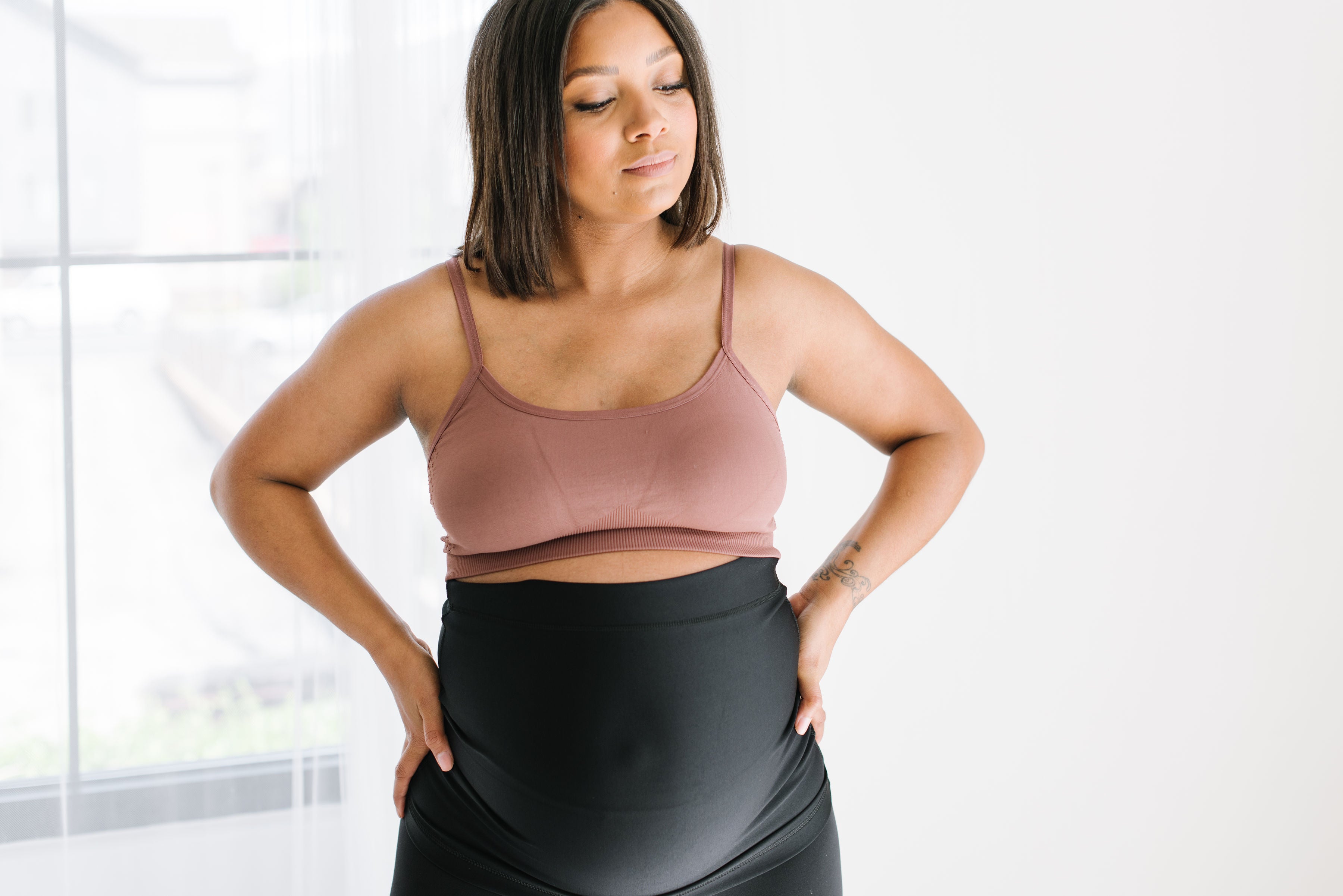 Front of seamless maternity and nursing bralette in color latte